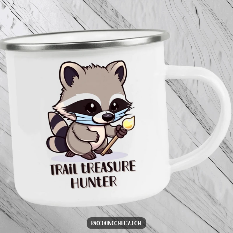 Funny camping mug showing a cute, masked raccoon tiptoeing with a shiny object, designed for rugged humor during outdoor excursions.