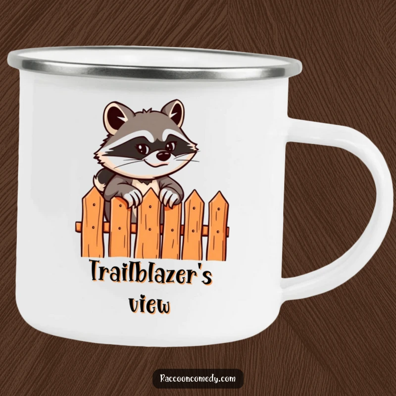 Funny enamel camping mug with a sly raccoon scaling a fence, ideal for outdoor humor and showcasing adventurous spirit.
