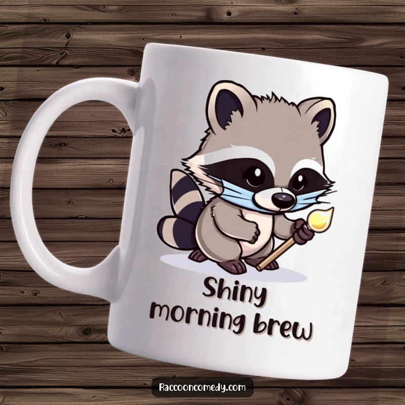 Funny mug depicting a cute raccoon with a masked face, tiptoeing stealthily with a coveted shiny object, evoking mischief and humor.