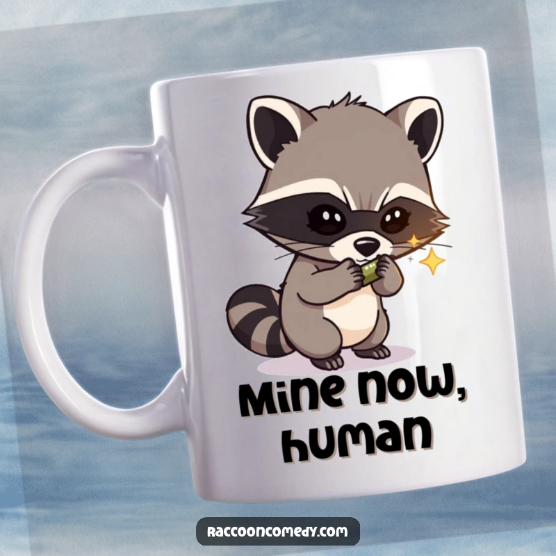 Funny mug showing a masked raccoon with a mischievous grin stealing a shiny gem, embodying playful thievery and humor.