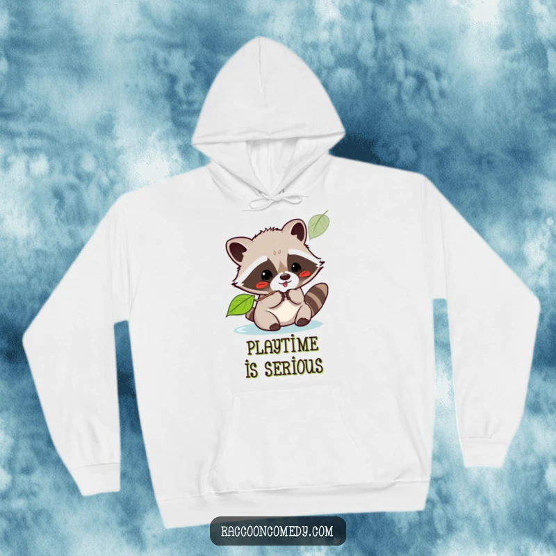 Funny kawaii raccoon playfully batting at a leaf, captured on a soft, cozy hoodie for ultimate comfort and cheer.