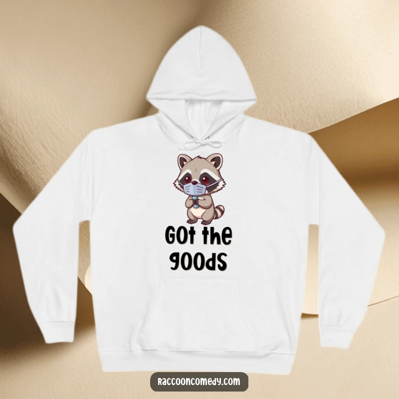 Funny Kawaii Raccoon Hoodie: Cute, masked raccoon holding a shiny object, perfect for cozy mischief.