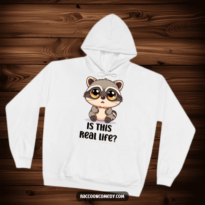 Funny kawaii raccoon with enormous googly eyes and a bewildered look, featured on a soft, cozy hoodie.