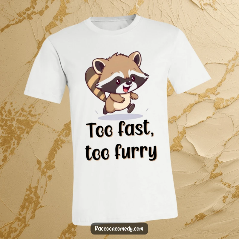 Funny t-shirt featuring an energetic raccoon cub in a clumsy scamper pose, capturing a moment of pure, joyful excitement.