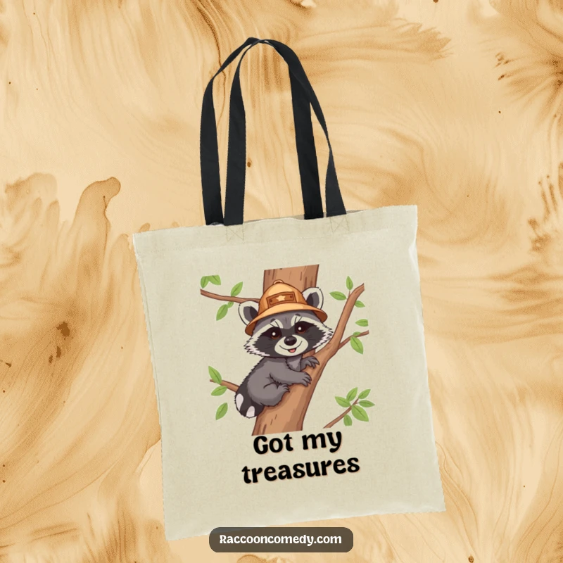 Funny tote bag depicting a happy raccoon cub with an explorer hat, climbing a tree, perfect for carrying gear with a smile.